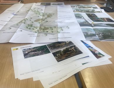 Maps and photos on a table